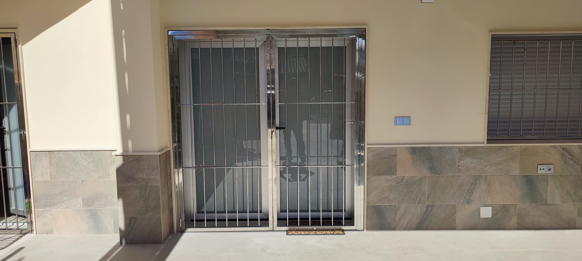 Puerta reja de 2 hojas de acero